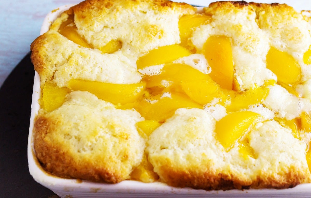 Simple Peach Cobbler is an easy and yummy dessert to whip up. It is simply a dump it and bake it type of dessert. Easy and delicious, it doesn't get any better.