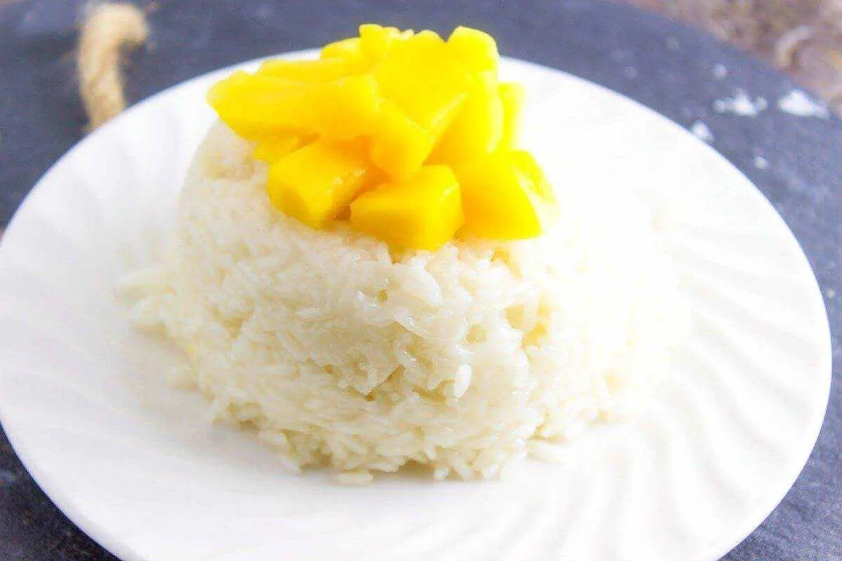Mango Coconut Sticky Rice is a simple sweet dessert that is popular in Thai restaurants. This dish is so is the perfect to have after a heavy meal. A recipe from Seduction in the Kitchen.