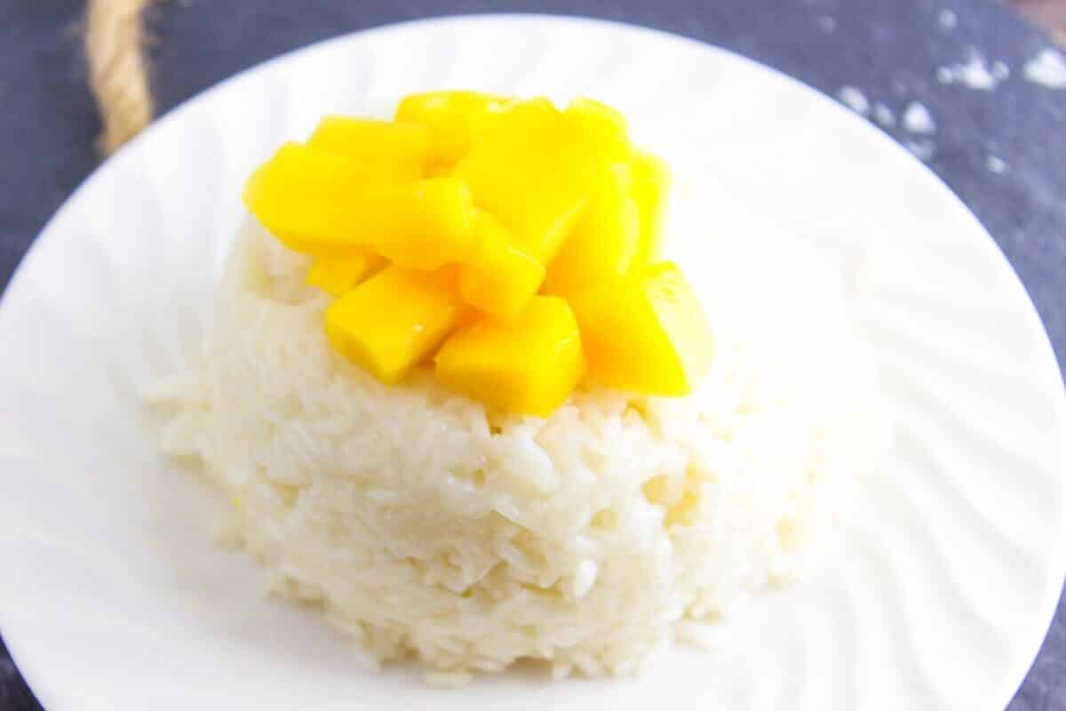 Mango Coconut Sticky Rice is a simple sweet dessert that is popular in Thai restaurants. This dish is so is the perfect to have after a heavy meal. A recipe from Seduction in the Kitchen.