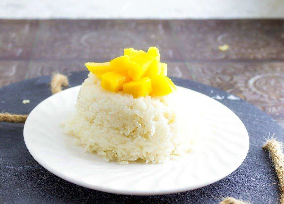 Mango Coconut Sticky Rice is a simple sweet dessert that is popular in Thai restaurants. This dish is so is the perfect to have after a heavy meal. A recipe from Seduction in the Kitchen.