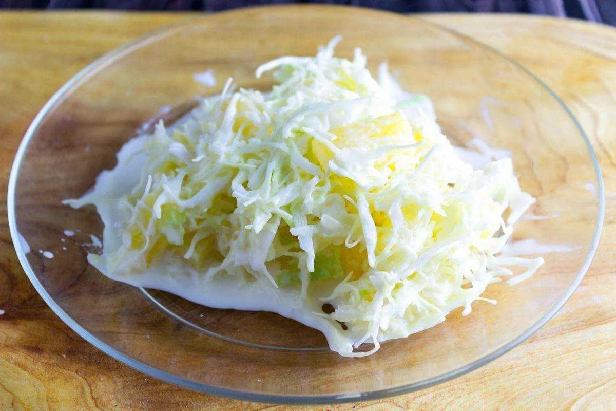 Texas Slaw is based on Cattlemen's Steakhouse cole slaw. The addition of sweet pineapples to this slaw is the secret ingredient. It is sweet and creamy and you are going to love it. Texas Slaw on a plate