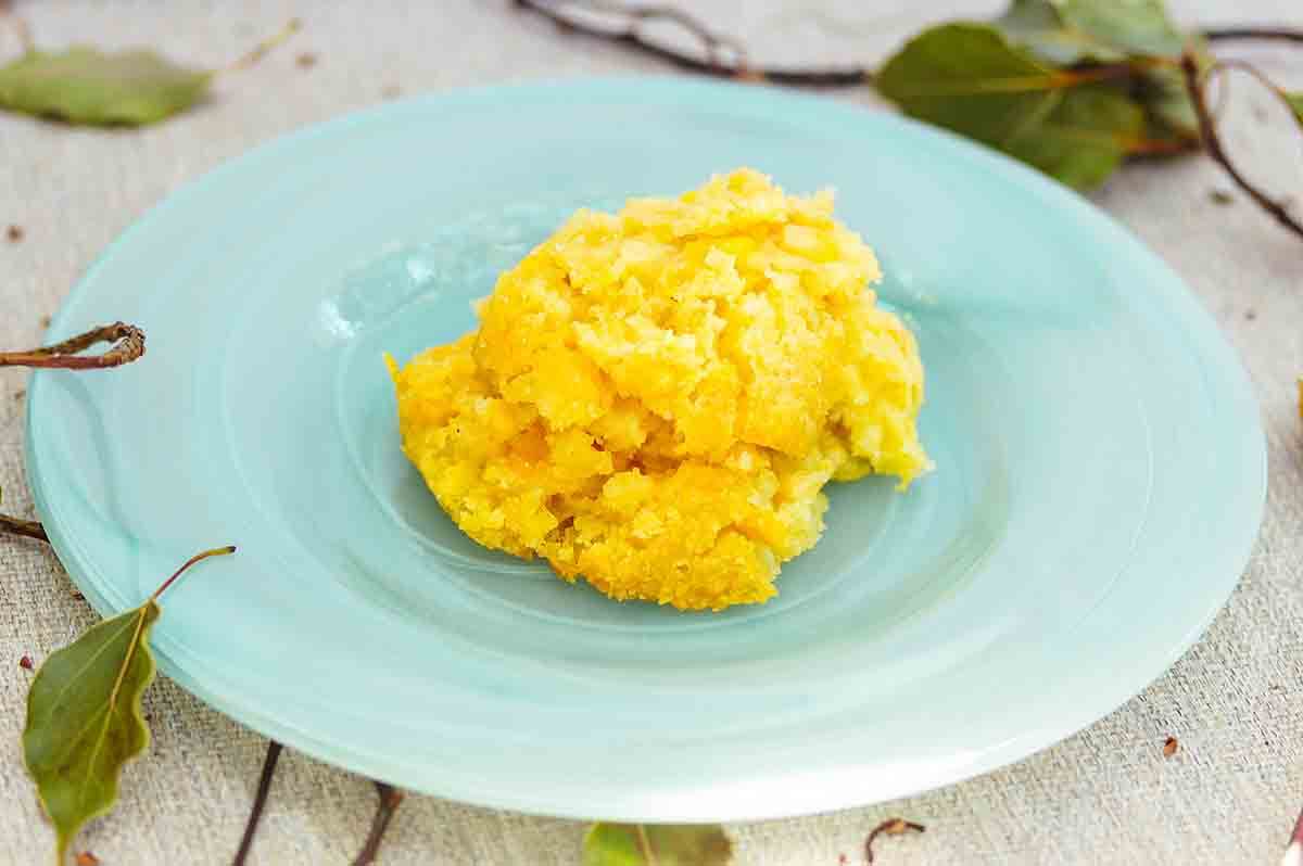 Sweet Corn Cake on blue plate with green leaves