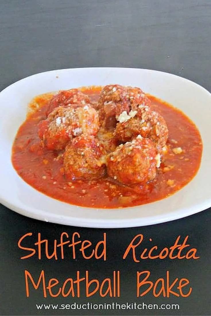 Stuffed Ricotta Meatball Bake secret to a melt in your mouth meatball is ricotta. Combine that with a center that has a tunnel of melted mozzarella cheese that is baked into a meatball casserole.