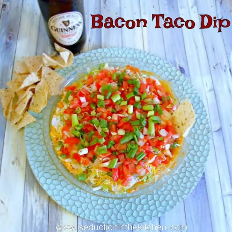 Bacon Taco Dip is a twist on taco dip that is very tasty and it also has bacon in it! Great for a party, Cinco de Mayo, or anytime you like!