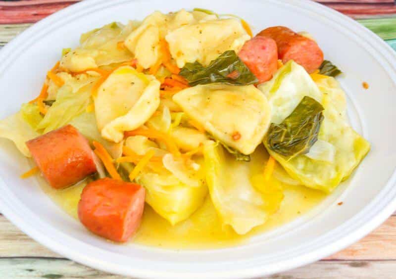 Buttery Slow Cooker Cabbage, Pierogies, and Kielbasa are a buttery, sweet cabbage combined with pierogies and kielbasa in a slow cooker. 