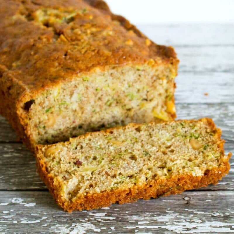 Pineapple Zucchini Bread is a sweet, tropical twist onto the traditional zucchini bread. This easy quick bread will be your new favorite treat with coffee!