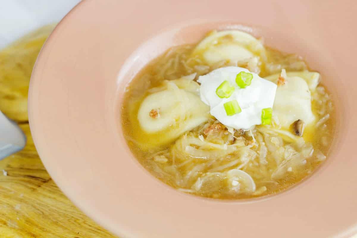 Pierogie Soup is comfort food in a bowl. Pierogies combined with the garlic kraut from Cleveland Kraut Cleveland Kraut make a satisfying soup! 