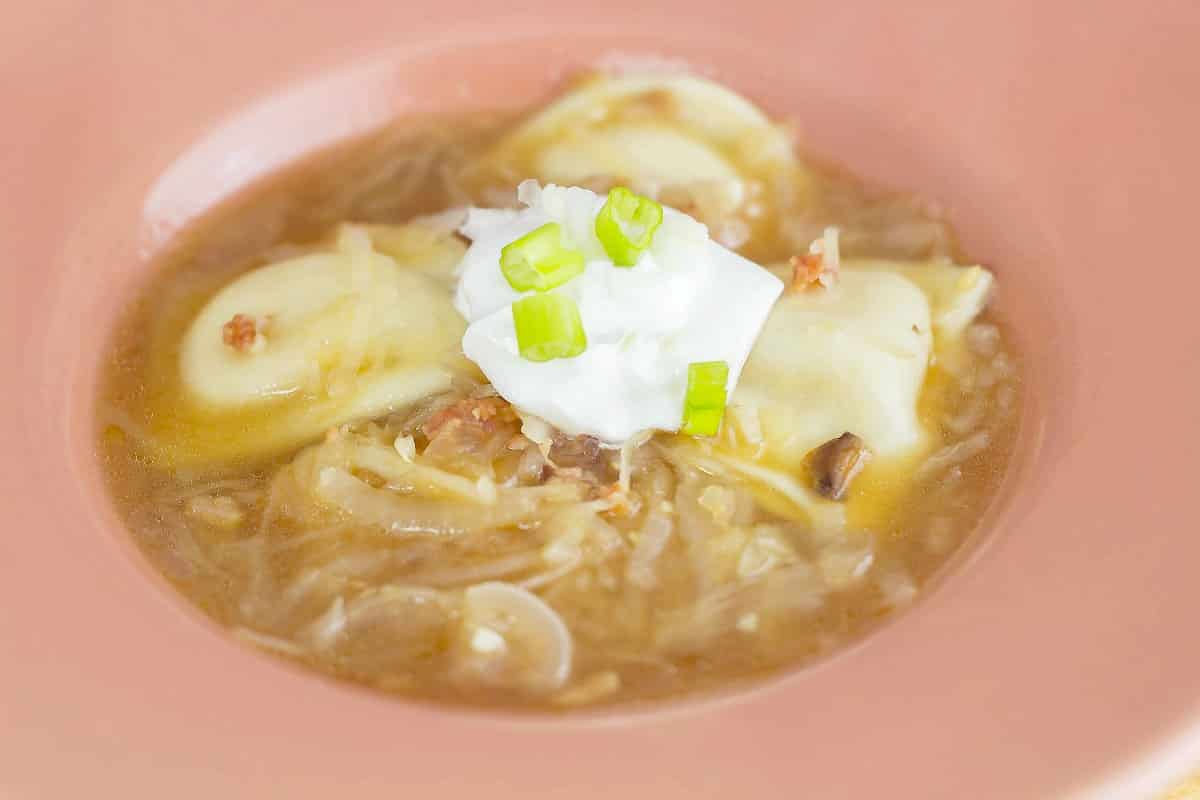 Pierogie Soup is comfort food in a bowl. Pierogies combined with the garlic kraut from Cleveland Kraut Cleveland Kraut make a satisfying soup! 