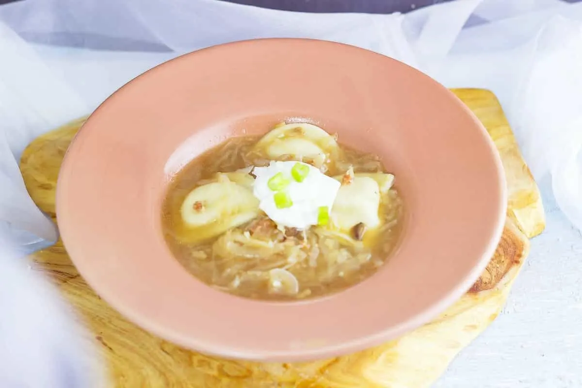 Pierogie Soup is comfort food in a bowl. Pierogies combined with the garlic kraut from Cleveland Kraut Cleveland Kraut make a satisfying soup! 