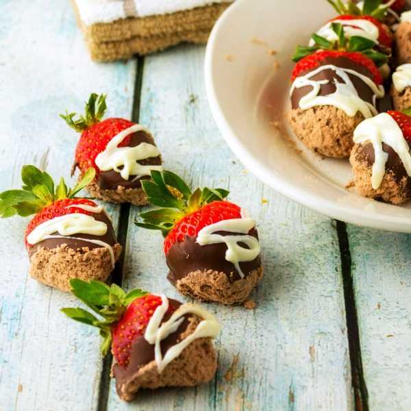 Red Velvet Chocolate Covered Strawberries With Cream Cheese Drizzle on table in bowl