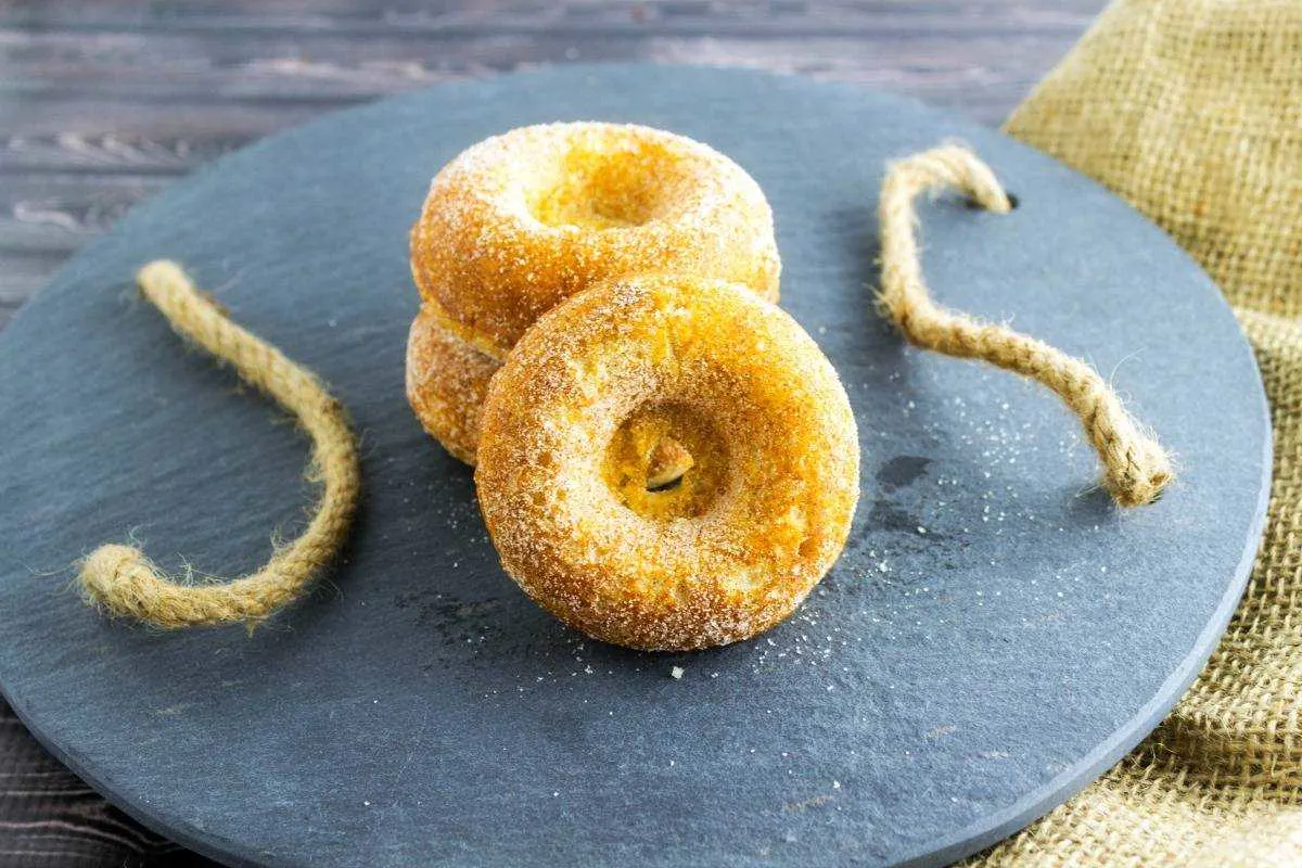Apple Cider Cake Mix Donuts is an easy way to make a homemade donut using cake mix and apple cider! A recipe from Seduction In The Kitchen.