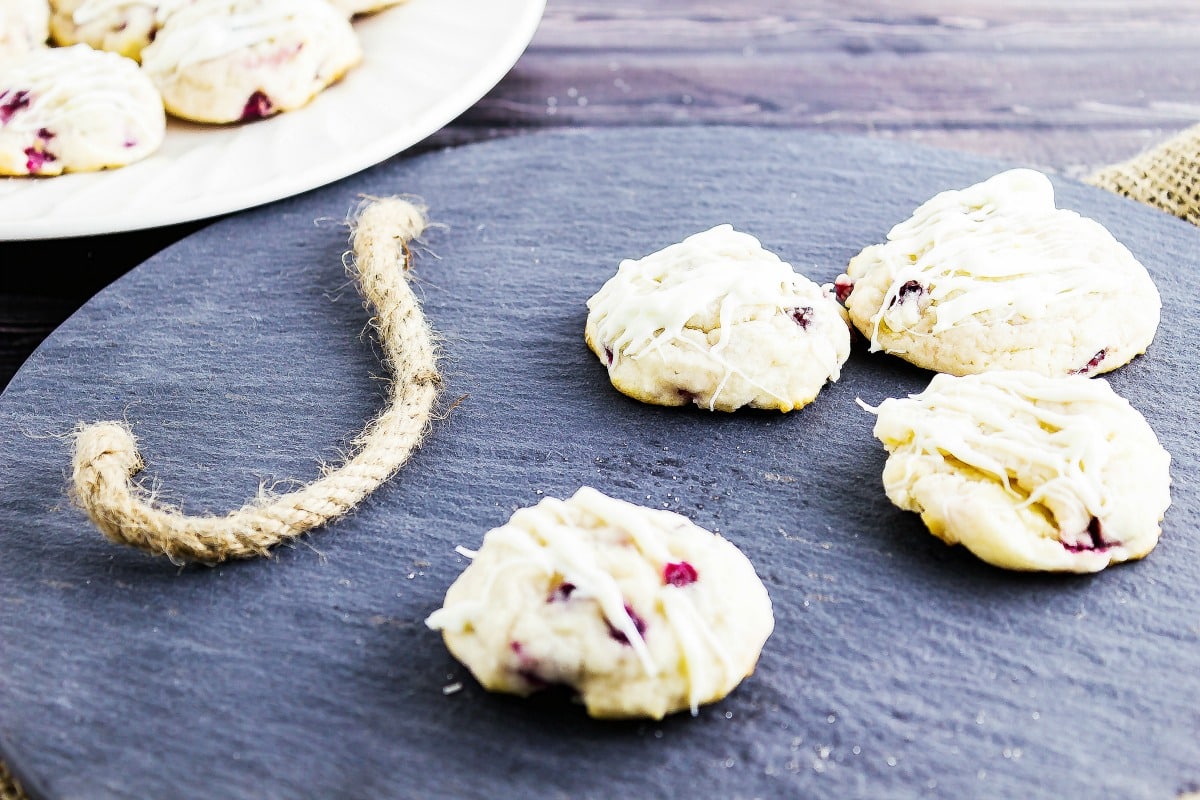 Lemon Pomegranate Cookies are a delightful cookie that is sinful with the white chocolate drizzle on it. One bite and you will be in love.