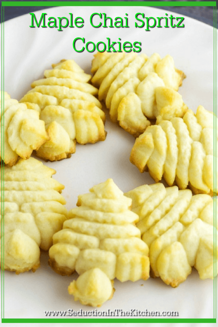 Maple Chai Spritz Cookies is a rich butter cookie that is flavored with Maple Butter from Minerva Dairy and Chai Syrup from Simple Gourmet Syrups. The combination of these two makes for a wonderful pressed cookie.