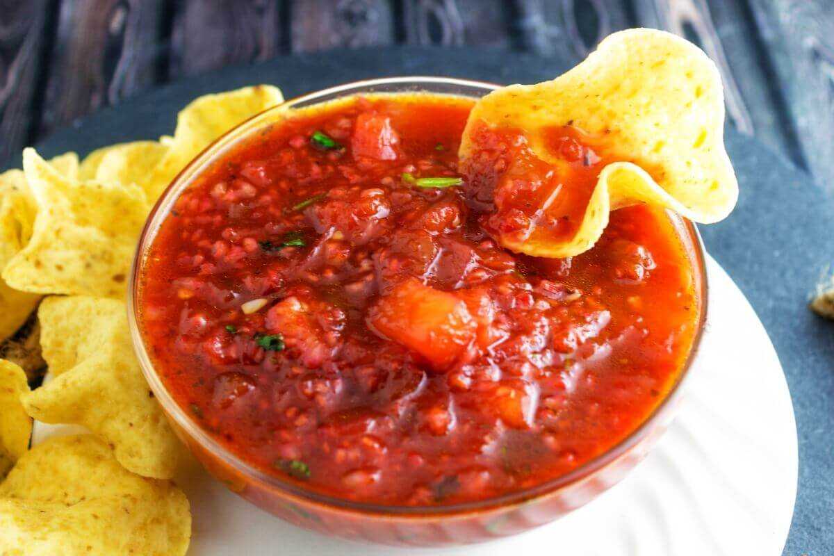 Raspberry Salsa with chip in bowl