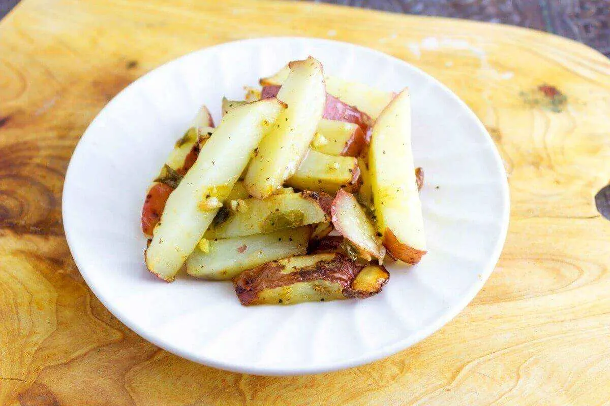 Baked Lemon Potato Wedges is a flavorful potato side dish that is loaded with a wonderful lemon flavor. These potatoes will easily become your new favorite side. A recipe from Seduction in the Kitchen.