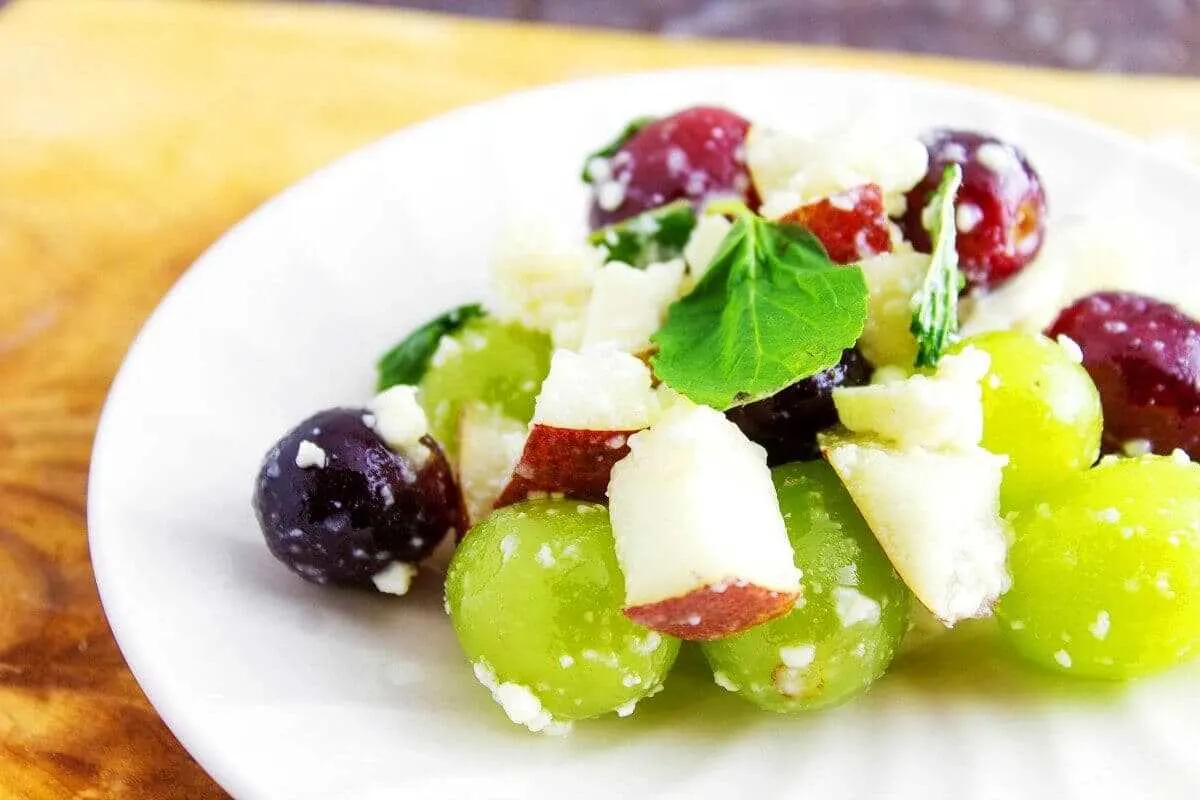 Grape and Feta Salad is a healthy and delicious salad that is simple to make. It is also a nice break from leafy green salads. This grape salad can easily be your new lunchtime favorite. A recipe from Seduction in the Kitchen.