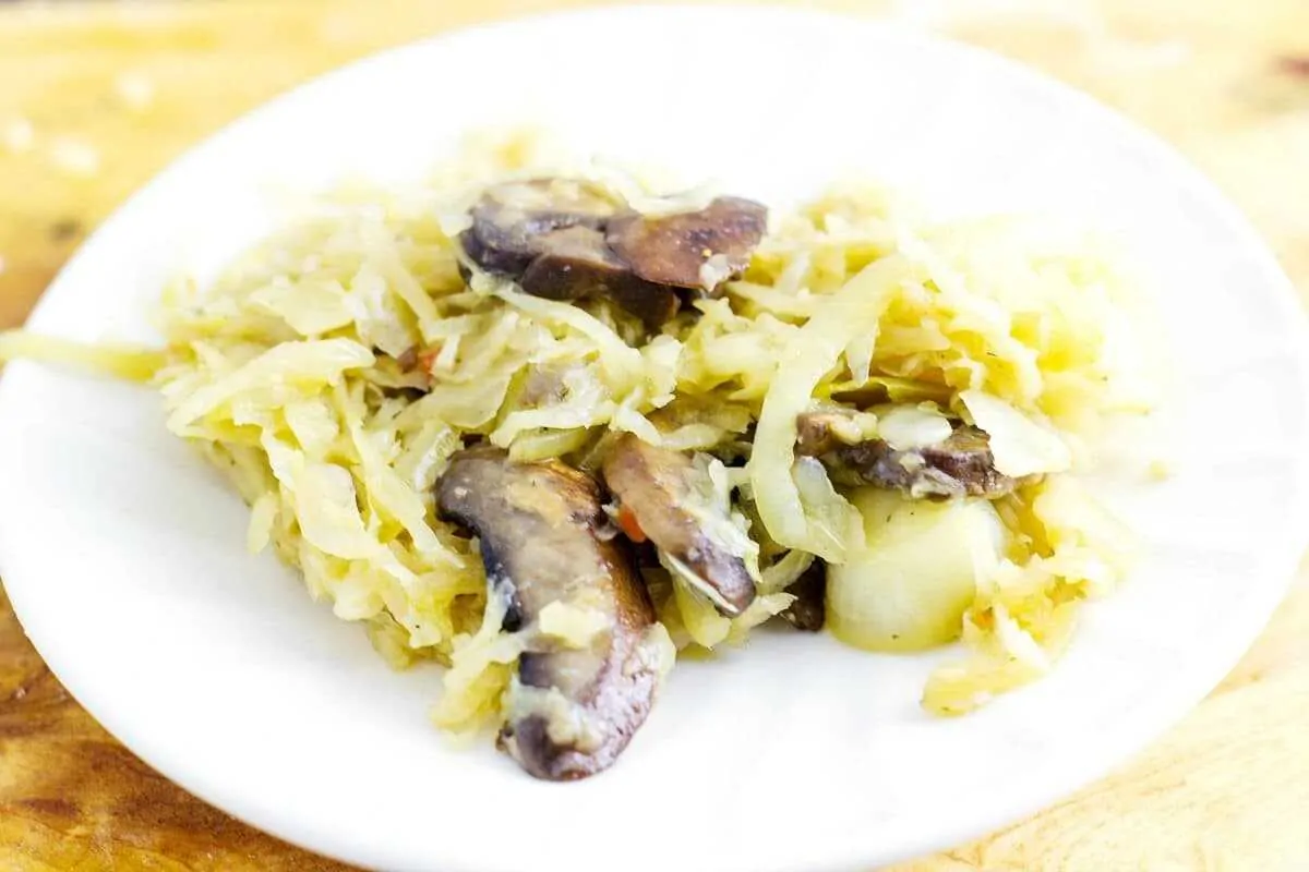 Saute Mushroom Sauerkraut was inspired by Pierogi filling. This savory side dish is perfect to pair with a pork entree. A recipe from Seduction in the Kitchen.