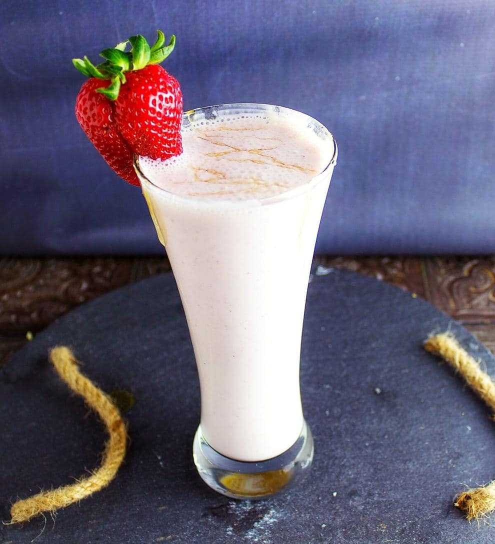 Honey Roasted Strawberry Cheesecake Smoothie is a healthy and delicious smoothie that you will love after a great workout! The honey roasted strawberries just make this smoothie pop with flavor. Best of all, it has no added sugar in it!