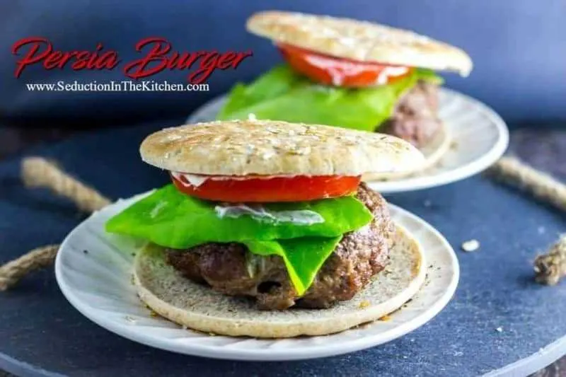 Persia Burger inspired by Persian meat kebabs. Onion and meat with spices grilled together then topped off with a roasted garlic lemon aioli. #Burgermonth2017
