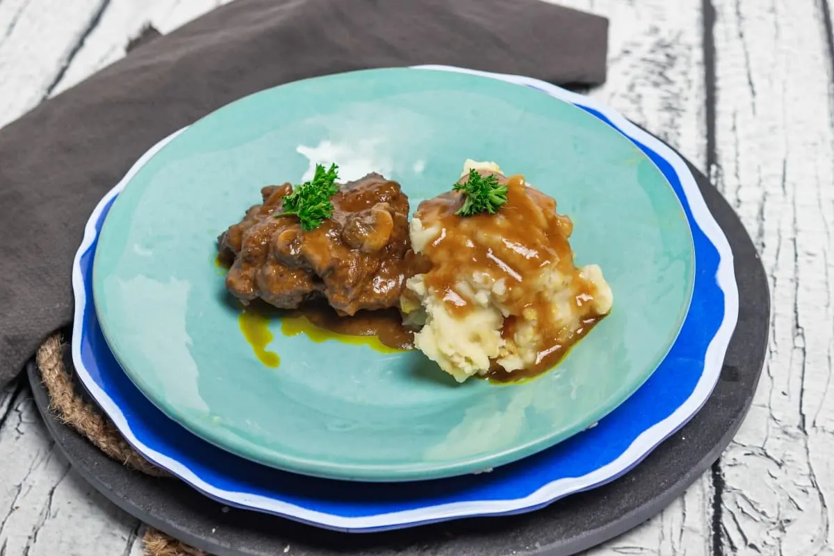 Slow Cooker Salisbury Steak Wide view on table