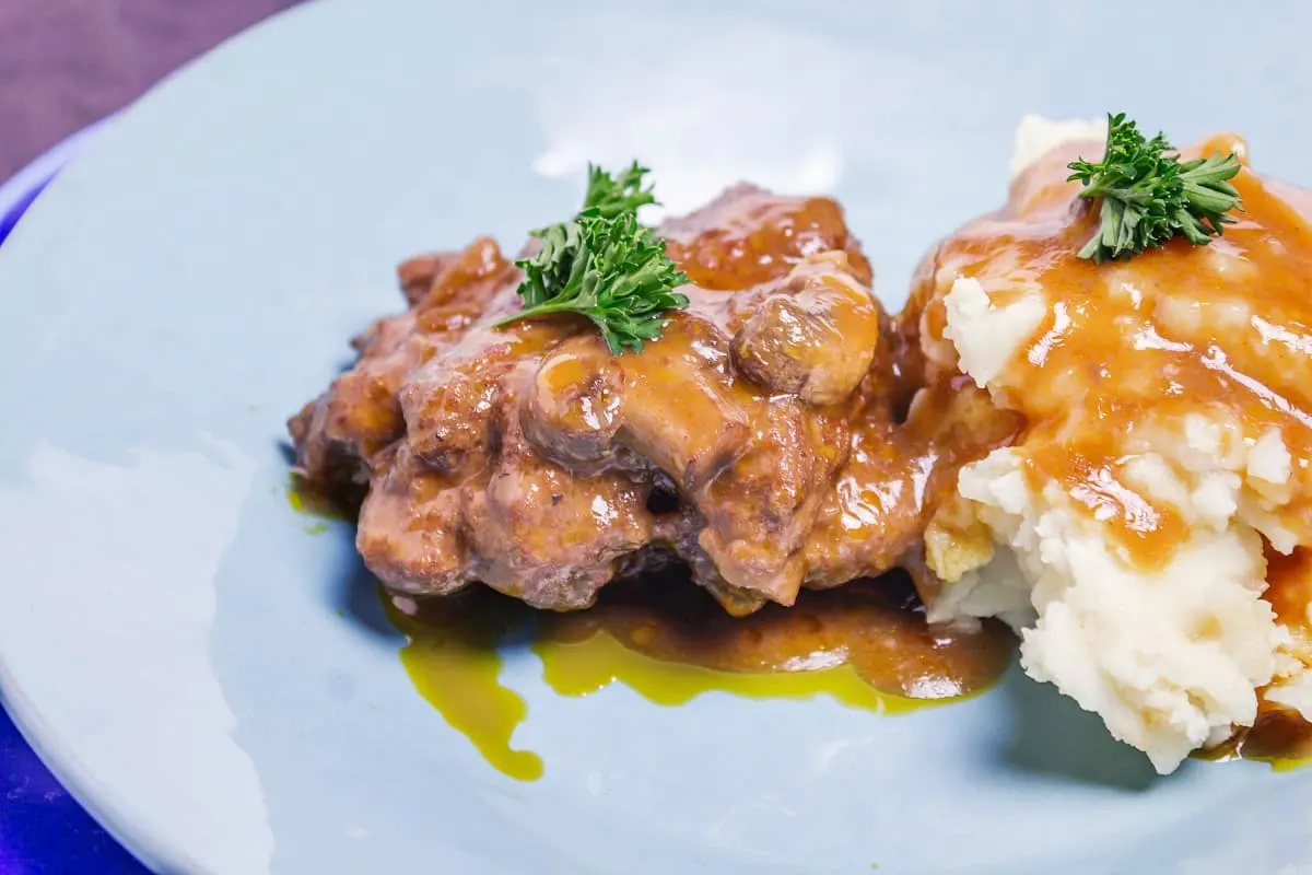 Slow Cooker Salisbury Steak with mashed potatoes covered in gravy