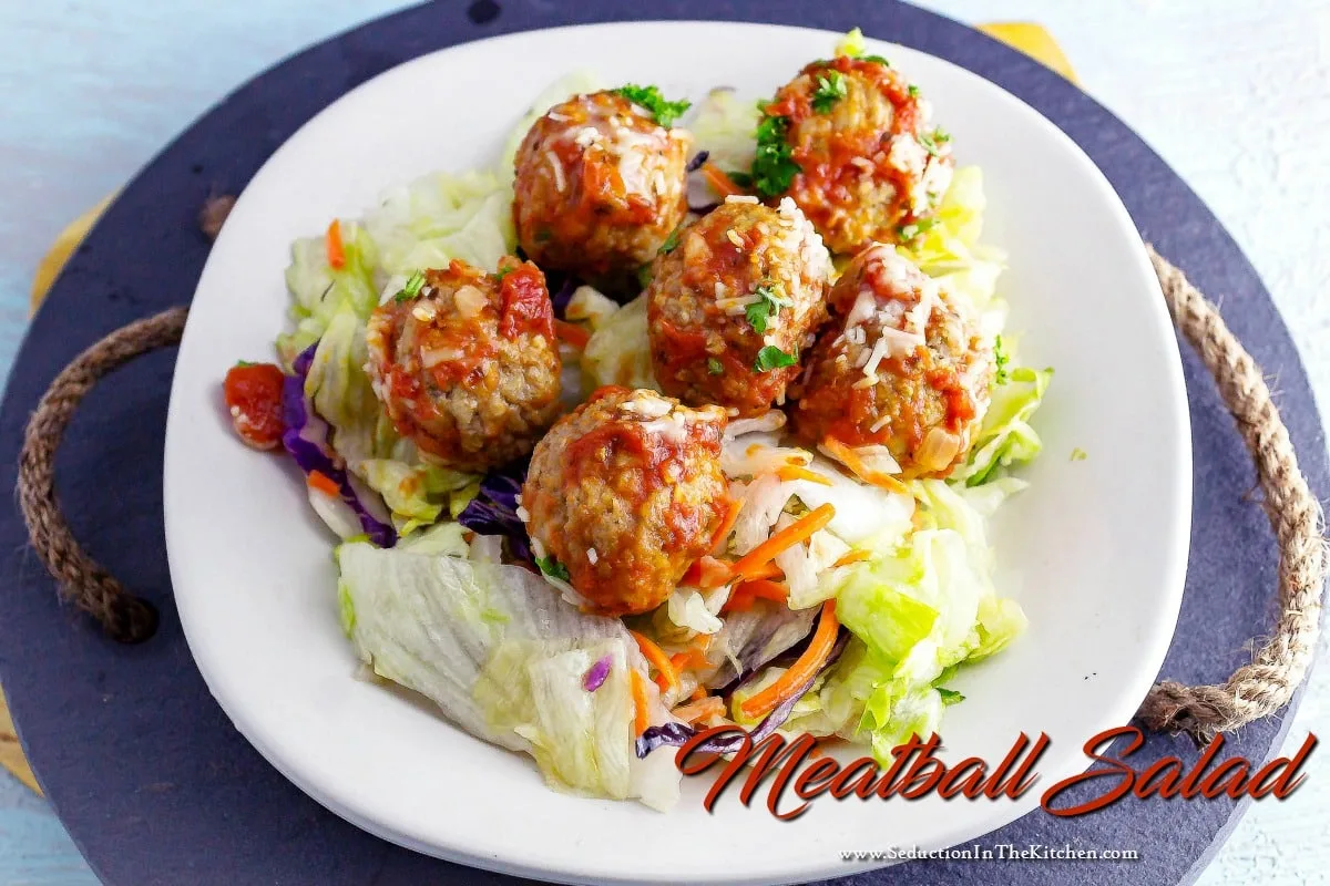 Meatball Salad is an Italian meal salad. Homemade meatballs on top of a white balsamic salad will fill you up with its yummy flavor combination. 