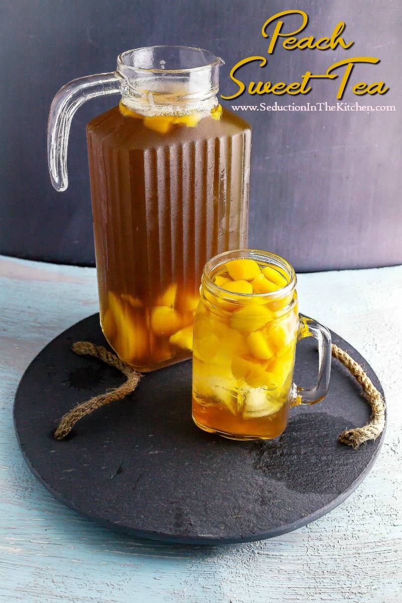 Peach Ice Tea glass and pitcher on black slate tray