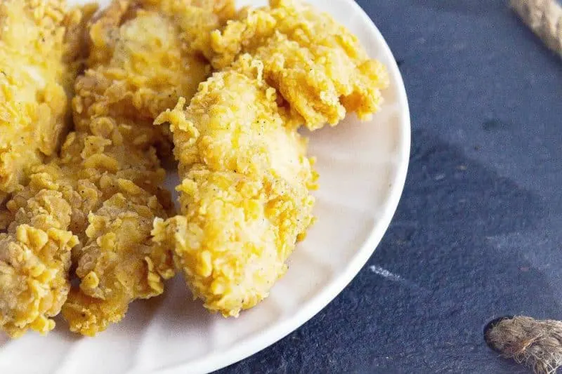 Air Fryer Cheddar Sour Cream Potato Chip Chicken Tenders are a wonderfully crispy, flavorful chicken tender that uses very little oil to make. This simple recipe only takes 4 ingredients to create these chicken tenders