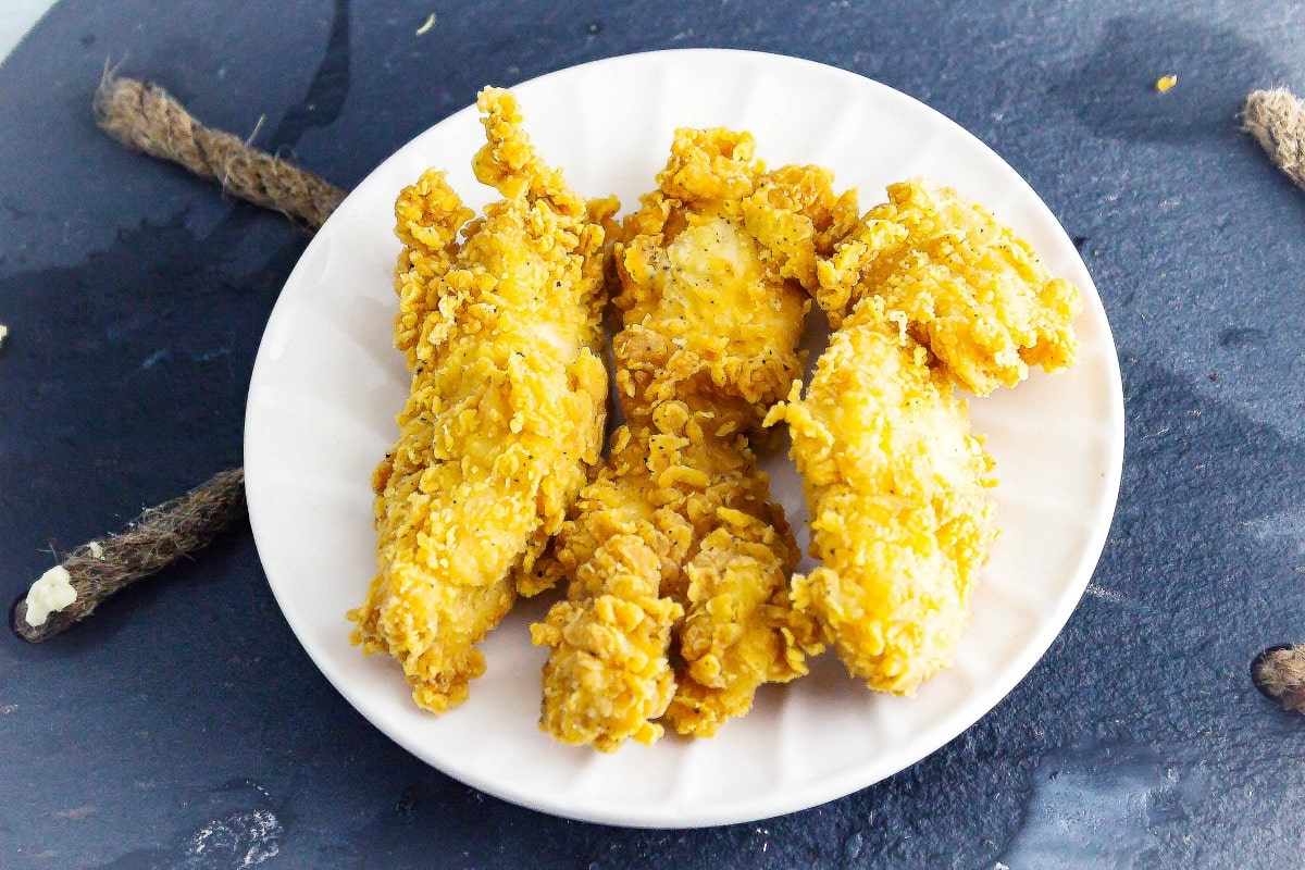 Air Fryer Cheddar Sour Cream Potato Chip Chicken Tenders are a wonderfully crispy, flavorful chicken tender that uses very little oil to make. This simple recipe only takes 4 ingredients to create these chicken tenders