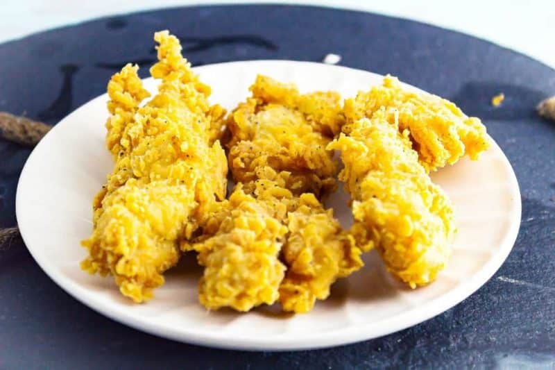 Air Fryer Cheddar Sour Cream Potato Chip Chicken Tenders are a wonderfully crispy, flavorful chicken tender that uses very little oil to make. This simple recipe only takes 4 ingredients to create these chicken tenders