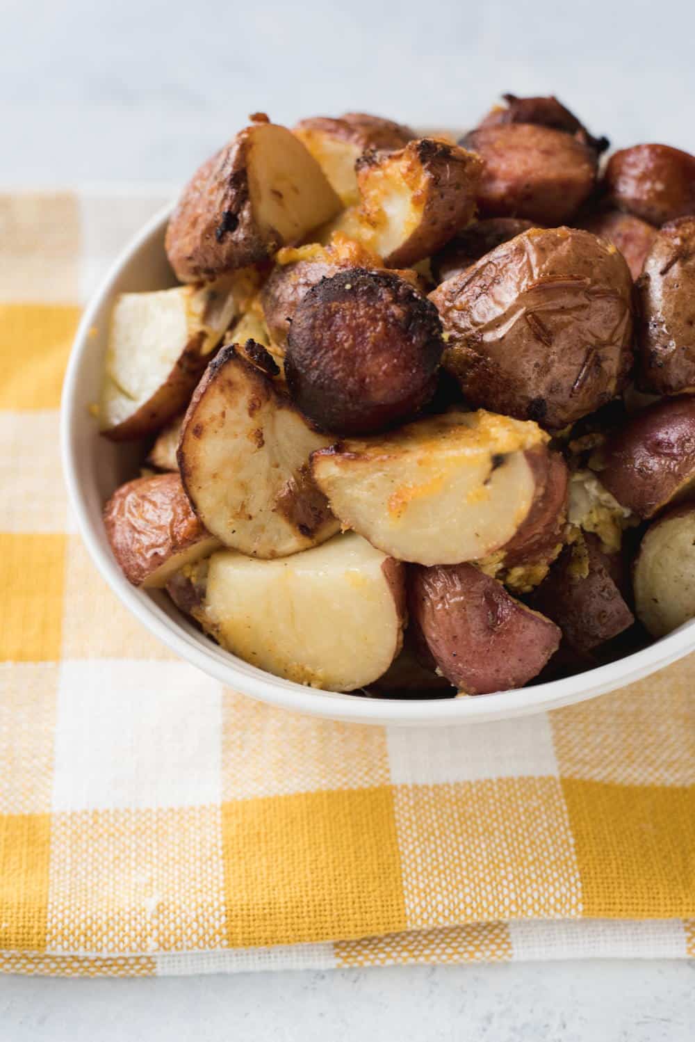 Bake Potato Casserole is a breakfast potato casserole that will knock your socks off. Cheese, onions, potatoes, and kielbasa come together for a hearty way to start your morning.