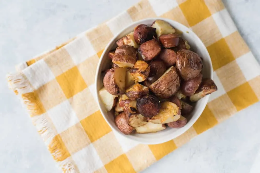 Bake Potato Casserole is a breakfast potato casserole that will knock your socks off. Cheese, onions, potatoes, and kielbasa equals yummy.