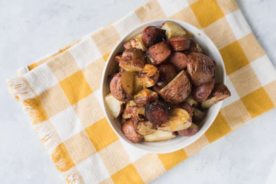 Bake Potato Casserole is a breakfast potato casserole that will knock your socks off. Cheese, onions, potatoes, and kielbasa come together for a hearty way to start your morning.