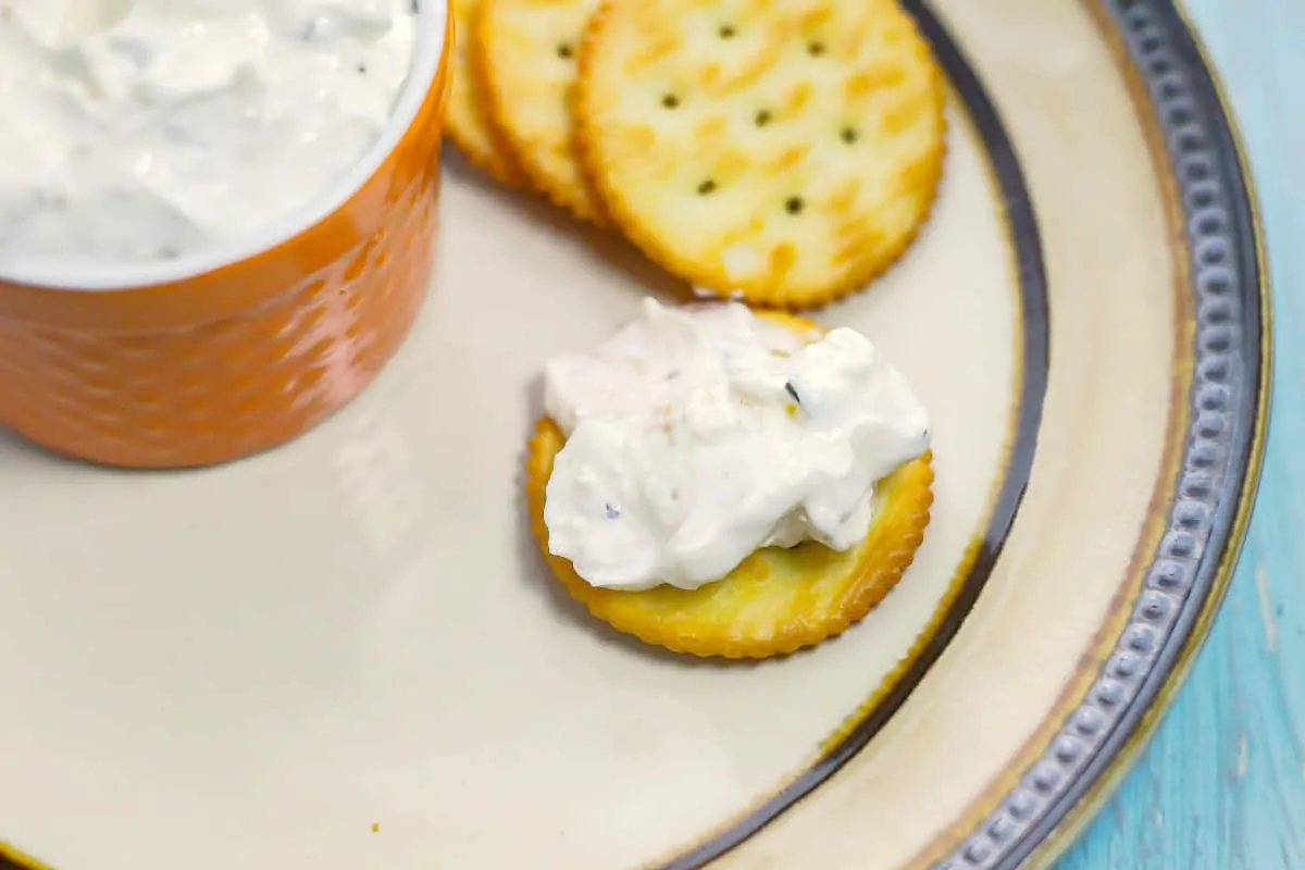 Feta Garlic and Chives Dip on a cracker