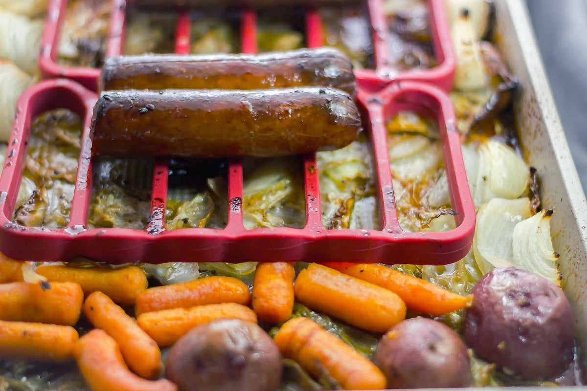 Sheet Pan Kielbasa and Cabbage uses OXO's sheet pan and silicone baking rack to create an easy buttery dinner that a family would enjoy! done from oven