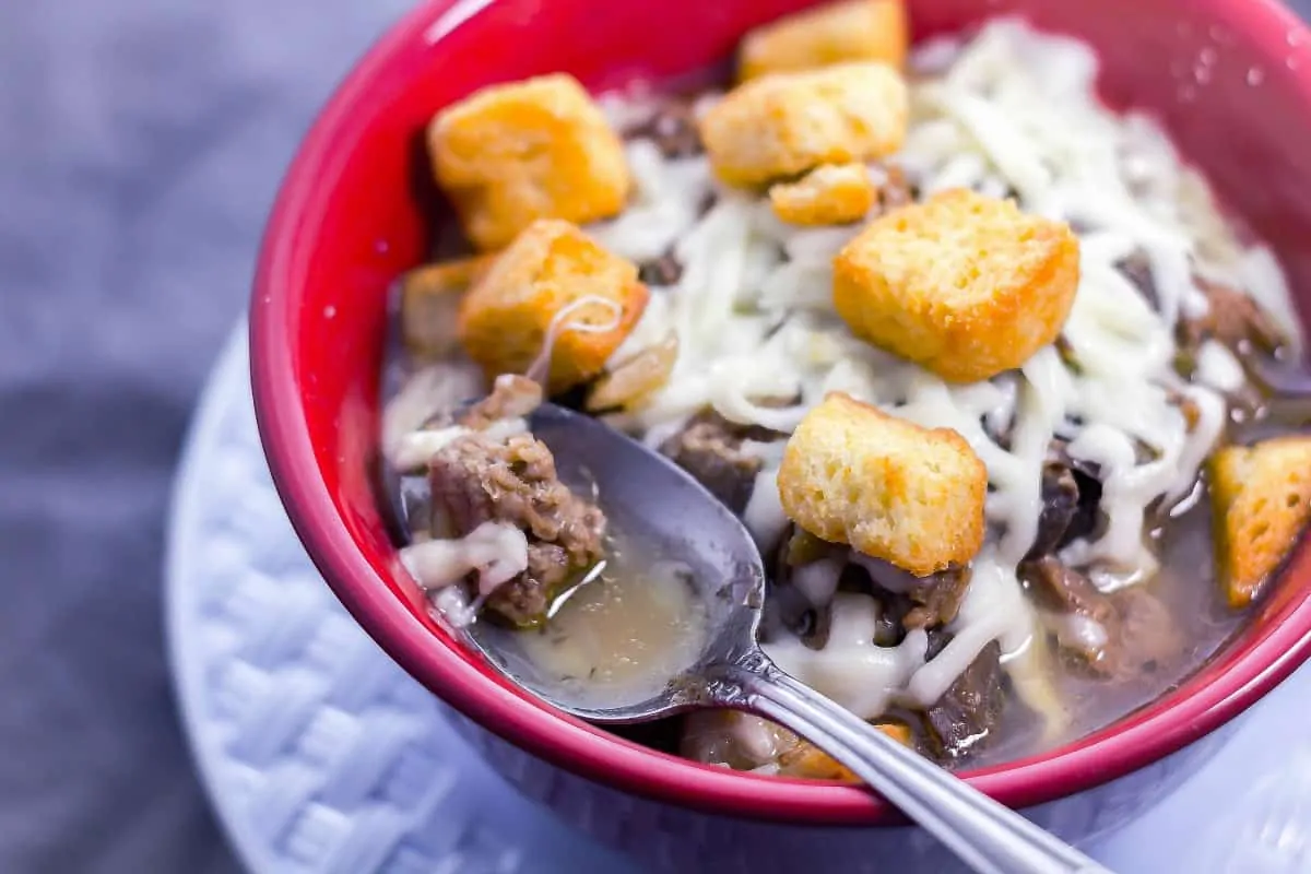 Slow Cooker Philly Cheese Steak Soup takes the Philly cheesesteak sandwiches and makes a yummy and filling soup out of it.