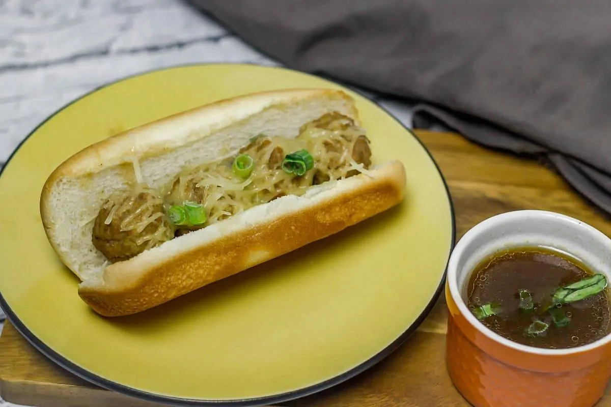 French Dip Meatball Subs is an easy and budget-friendly slow cooker meal. These meatball subs are yummy, just like a French dip sandwich.