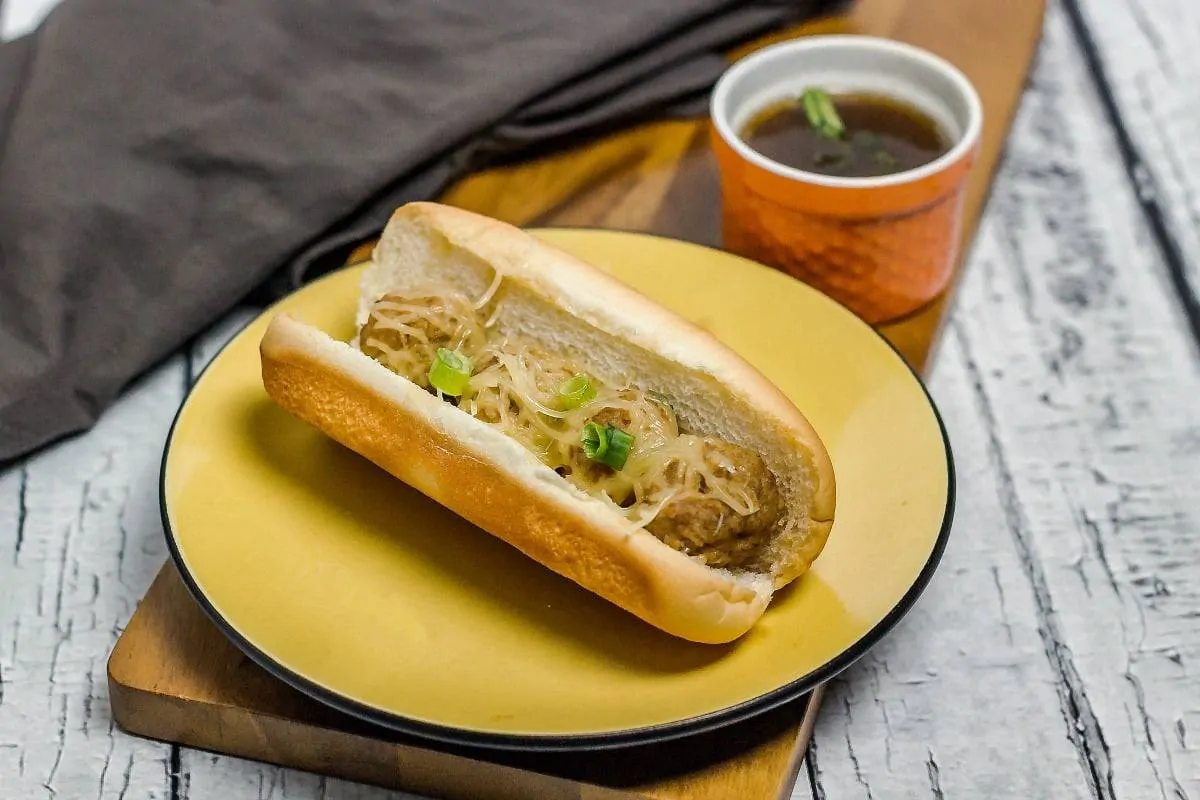 French Dip Meatball Subs is an easy and budget-friendly slow cooker meal. These meatball subs are yummy, just like a French dip sandwich.