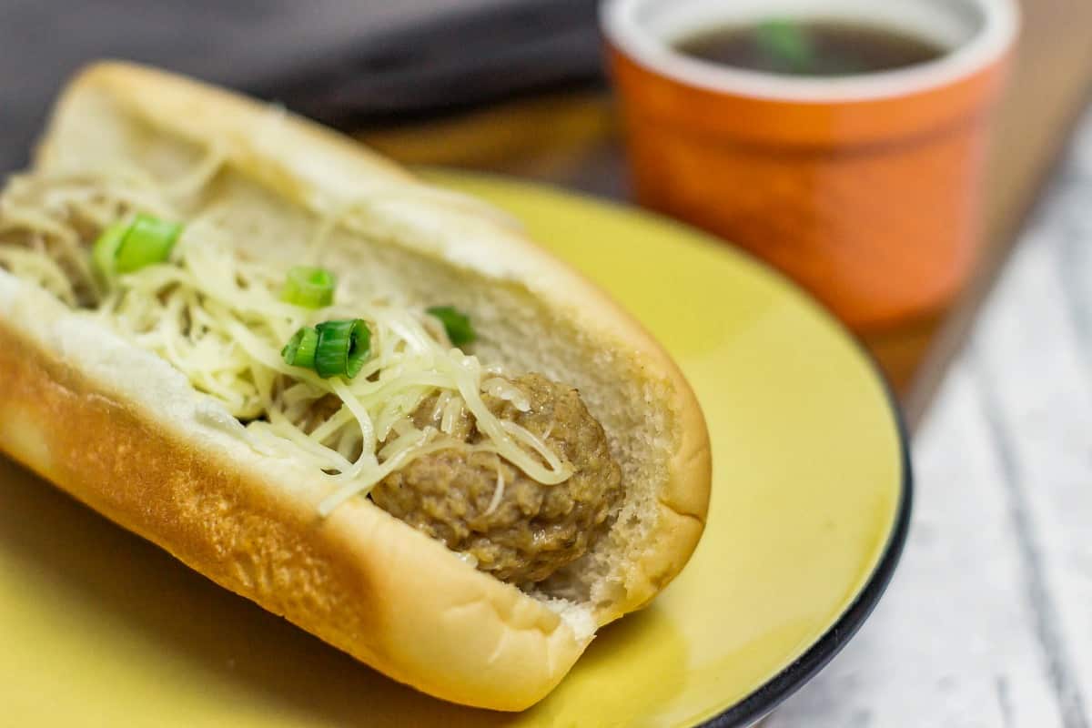 French Dip Meatball Subs is an easy and budget-friendly slow cooker meal. These meatball subs are yummy, just like a French dip sandwich.