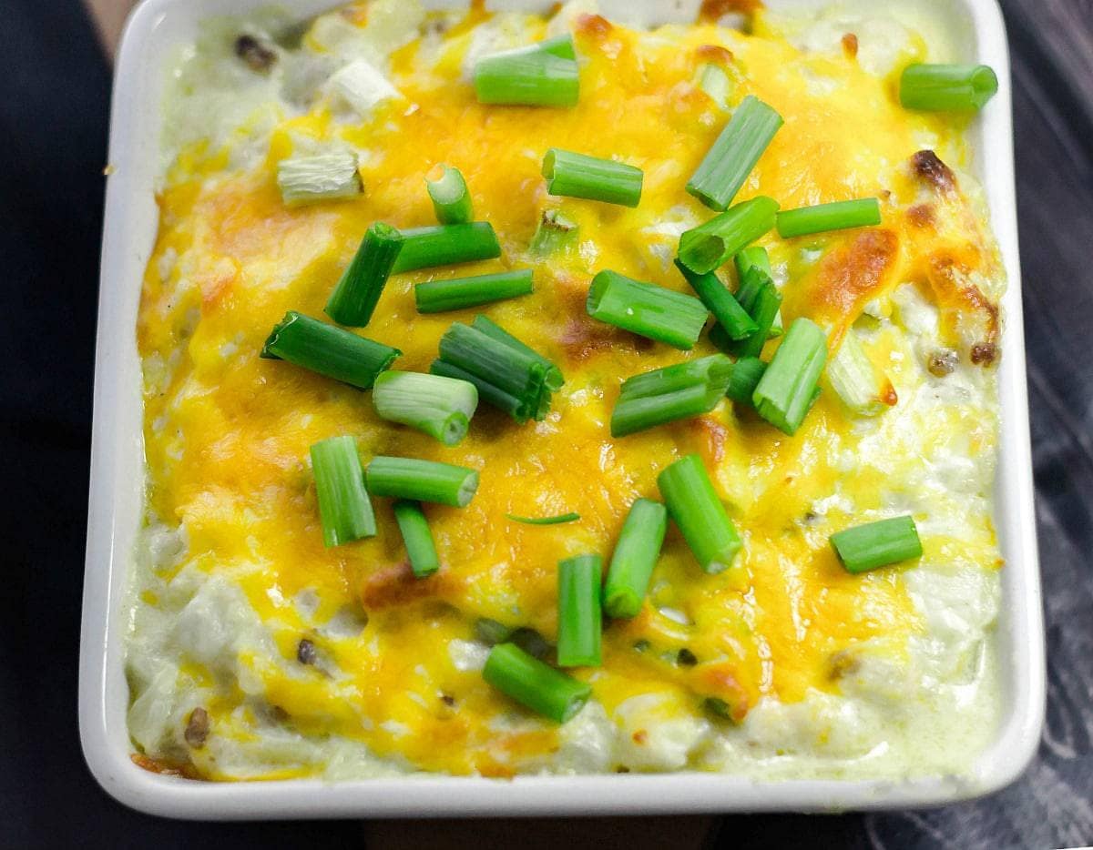 Loaded Mashed Cauliflower Casserole is a wonderful healthy low carb alternative for loaded mashed potatoes! It will be your favorite new side dish!