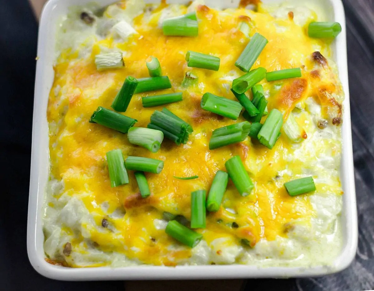 Loaded Mashed Cauliflower Casserole is a wonderful healthy low carb alternative for loaded mashed potatoes! It will be your favorite new side dish!