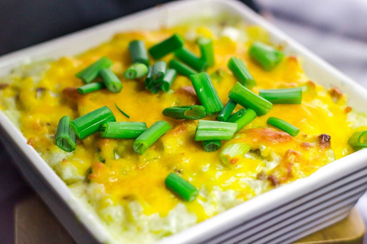 Loaded Mashed Cauliflower Casserole is a wonderful healthy low carb alternative for loaded mashed potatoes! It will be your favorite new side dish!