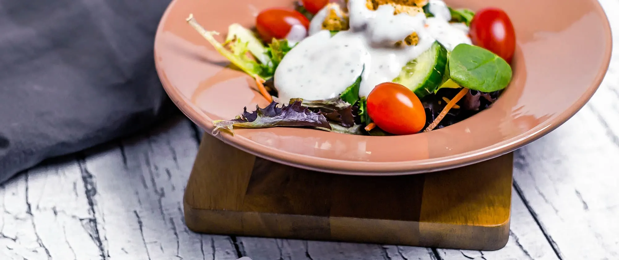 Easy Homemade Yogurt Ranch Dressing On salad in bowl