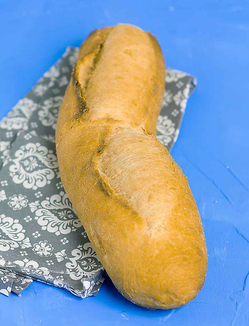 French Baguette Bread log view o bread on blue background