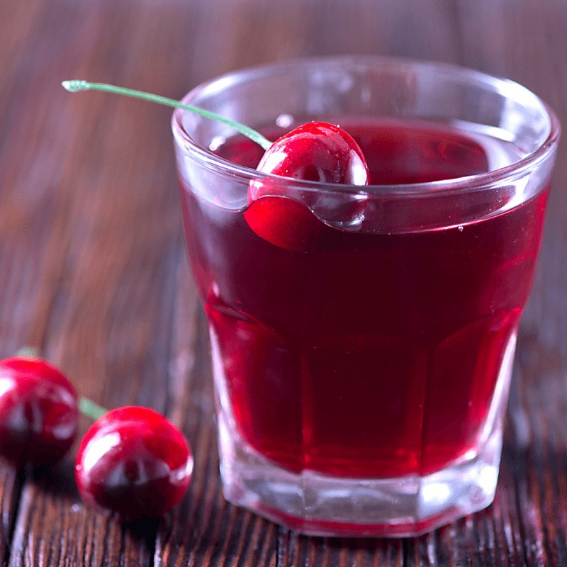 Cherry lime rickey cocktail close up drink in glass with cherry