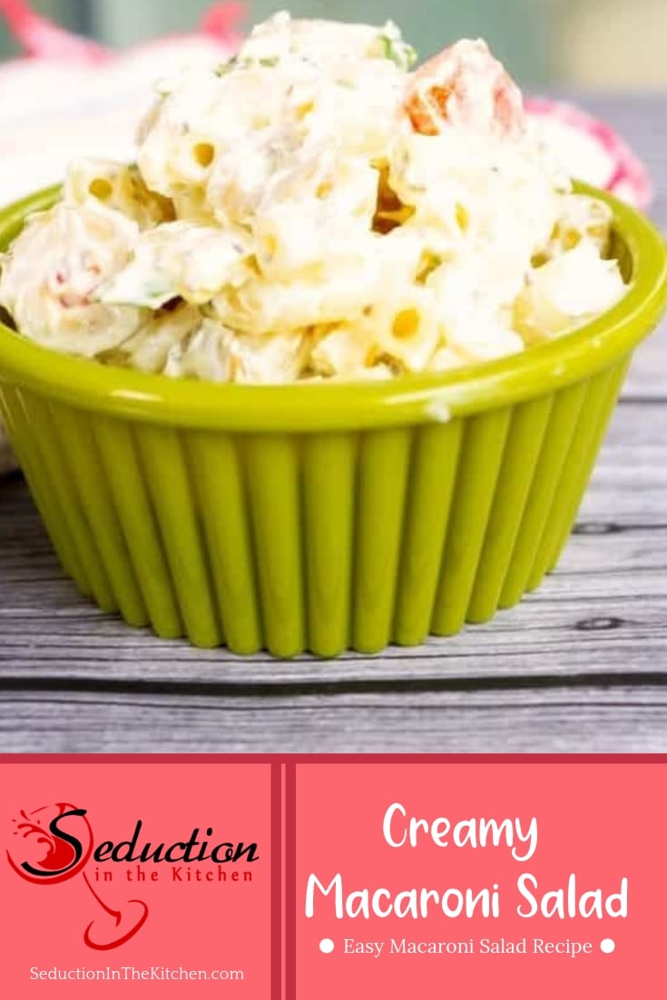 creamy macaroni salad in green dish pin