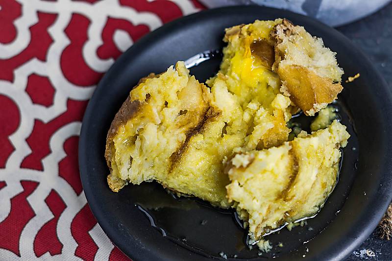 Instant Pot Limoncello Bread Pudding close up on black plate