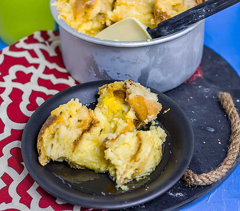 Instant Pot Limoncello Bread Pudding on a black plate