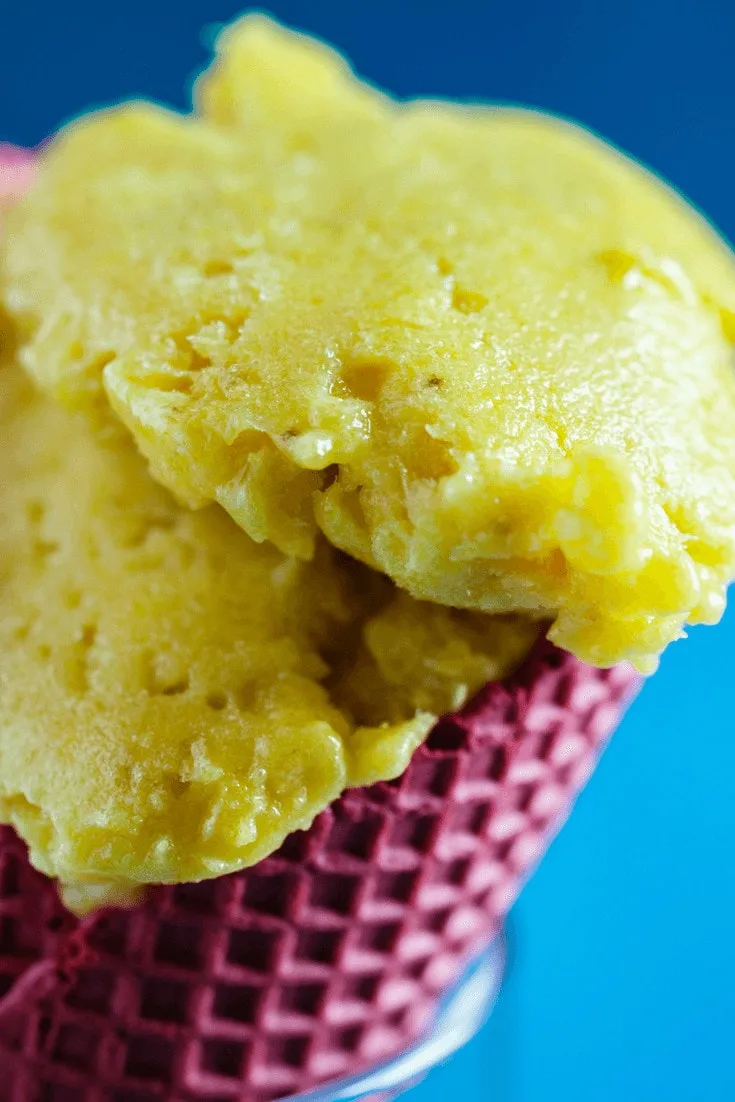 Do you want an easy no-churn sorbet? This Green Tea Sorbet is easy to make. The best part of this sorbet is that is is not made in an ice cream maker. Plus it requires only a few ingredients as well. green tea sorbet close up in purple cone