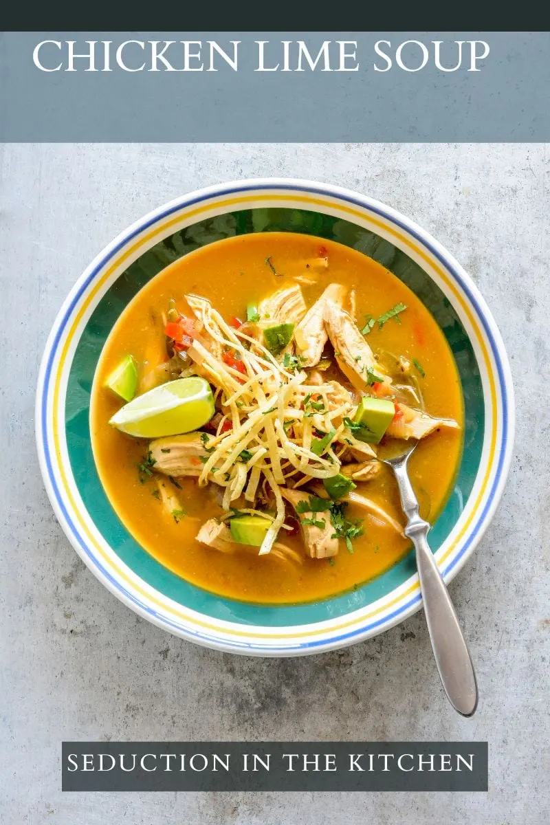 Chicken Lime Soup {Southwest Chicken Soup} Chicken Soup with Lime In bowl with green ring